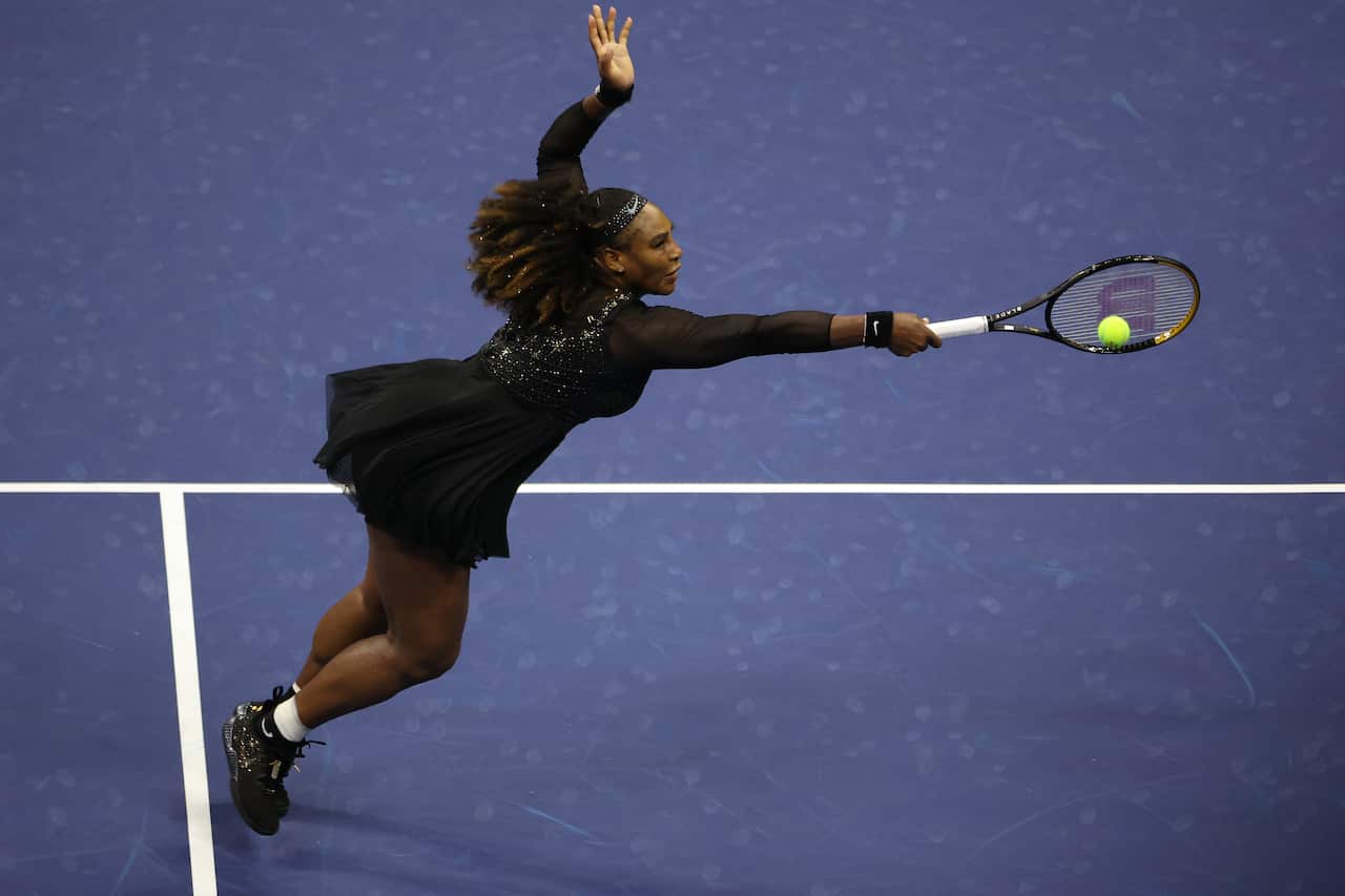 Serena Williams returns a shot Danka Kovinic of Montenegro during the Women's Singles First Round on day one of the 2022 US Open.