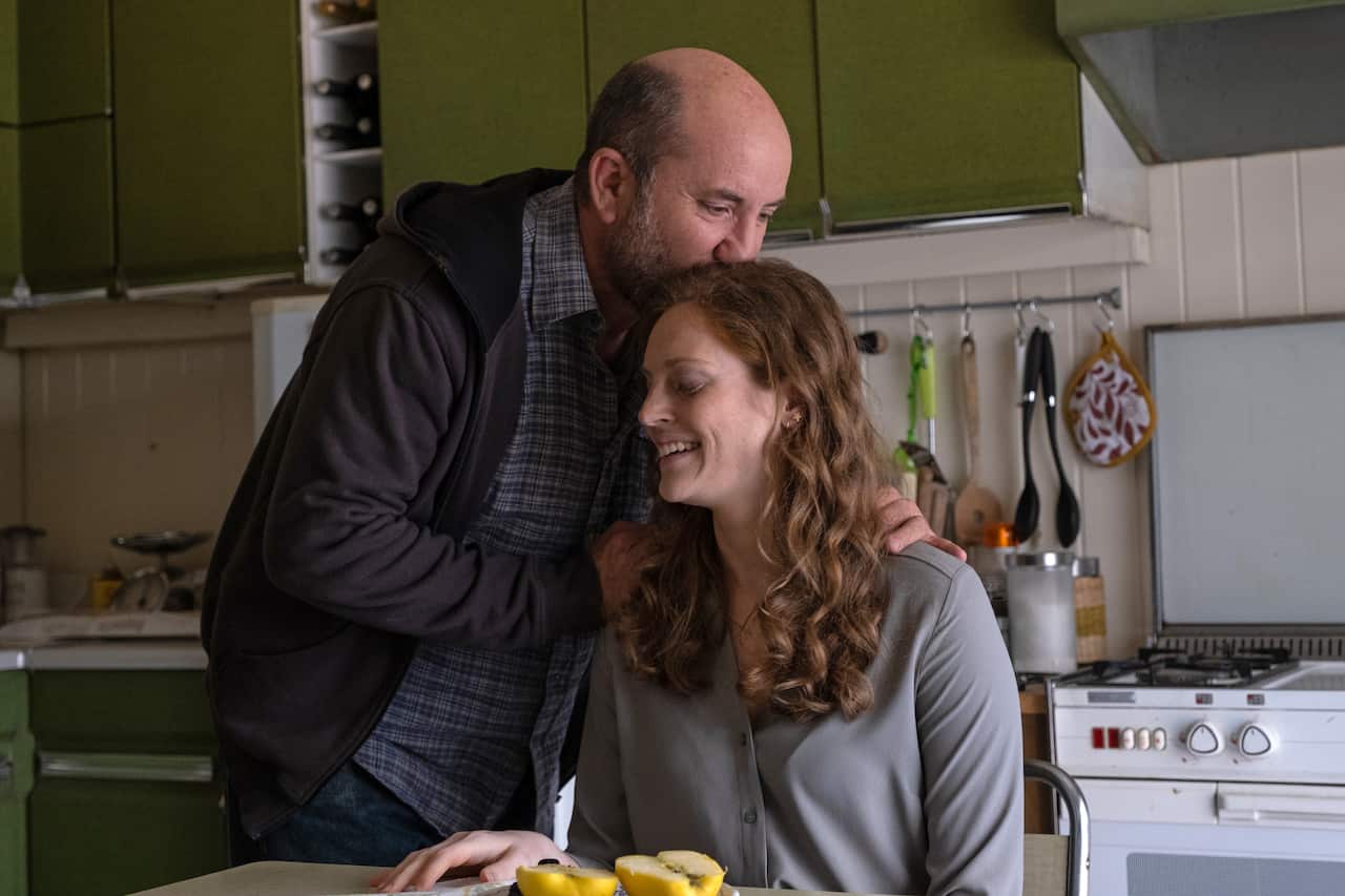 A scene from the film "One Hundred Sundays" featuring Antonio Albanese and Liliana Bottone.