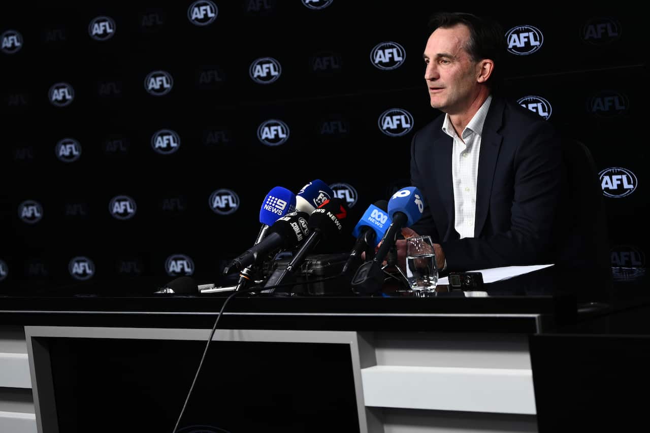 A man speaking at a press conference.