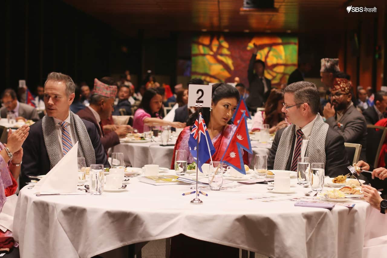 Tim James MP (L), Nepal's former crown princess Himani Shah (C) and Mark Coure MP (R)