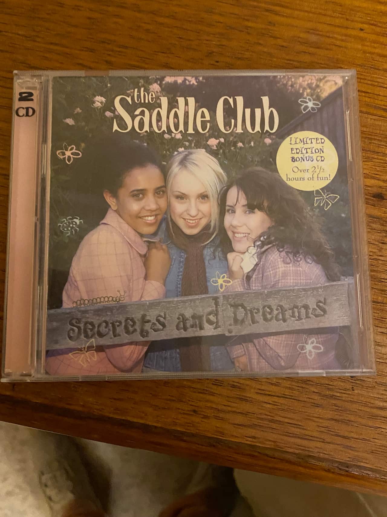 A CD of The Saddle Club