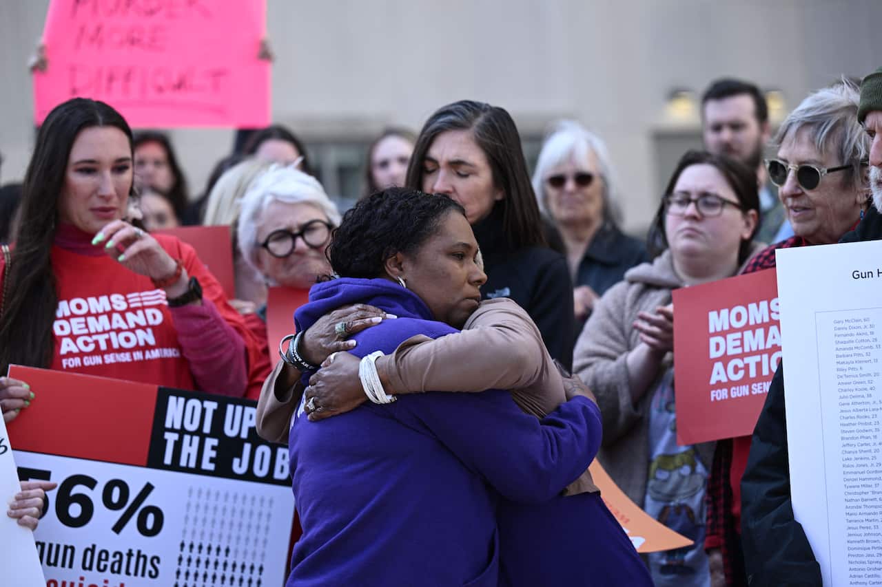 Gun control activists attend a rally in Nashville, Tennessee following a school shooting, where three students and three staff members were killed.