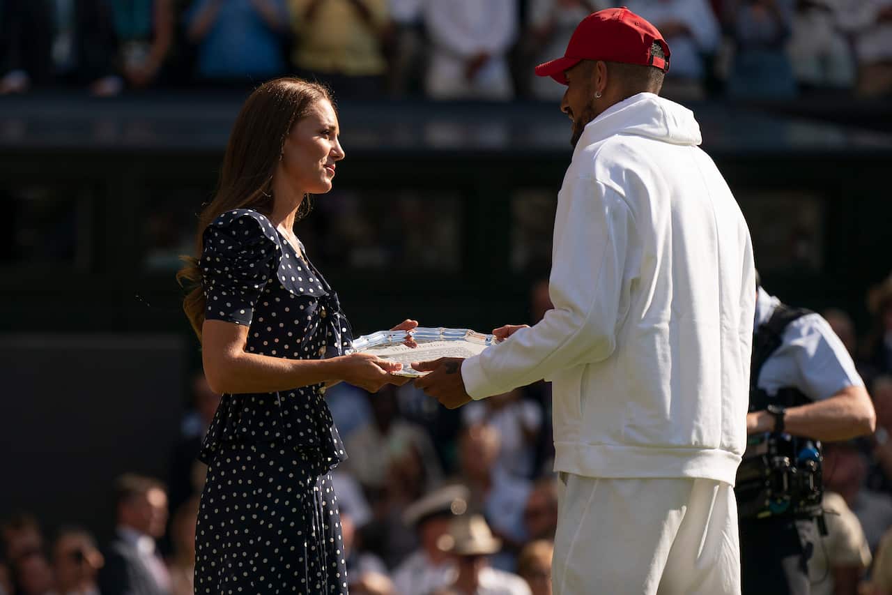 Her royal highness, Kate Middleton, The Duchess of Cambridge presents Nick Kyrgios the finalist plate after the mens final.