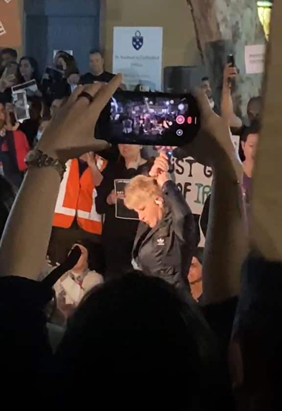 A woman cut her hair to protest against compulsory hijab in Iran
