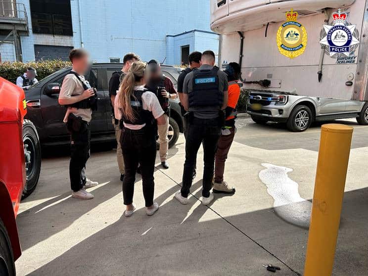 Police officers arresting a person