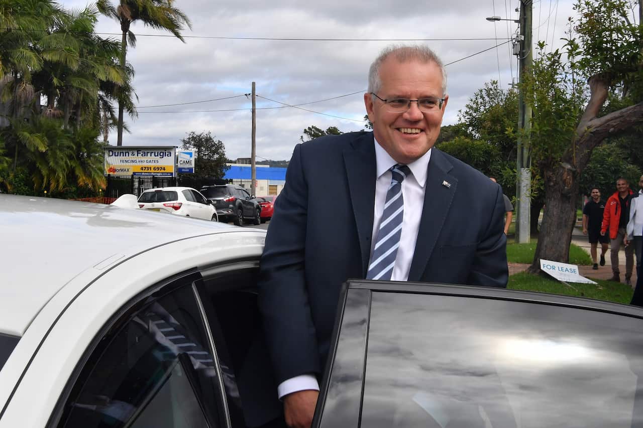 Prime Minister Scott Morrison gets into his car following a visit to the home of new homeowners Lachlan Kowaleski and Katie Macqueen in Jamisontown, Sydney on 1 April 2022.  
