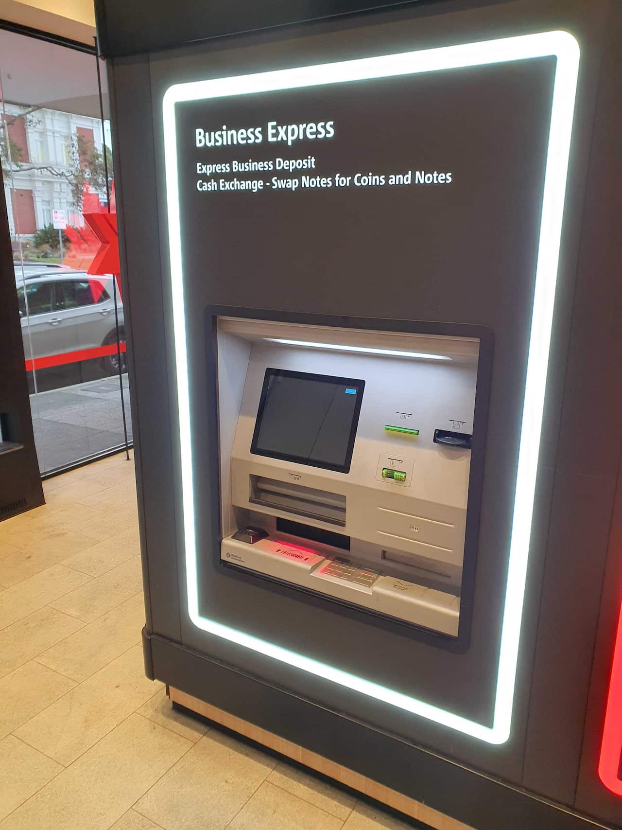 An ATM machine with a blacked-out screen.