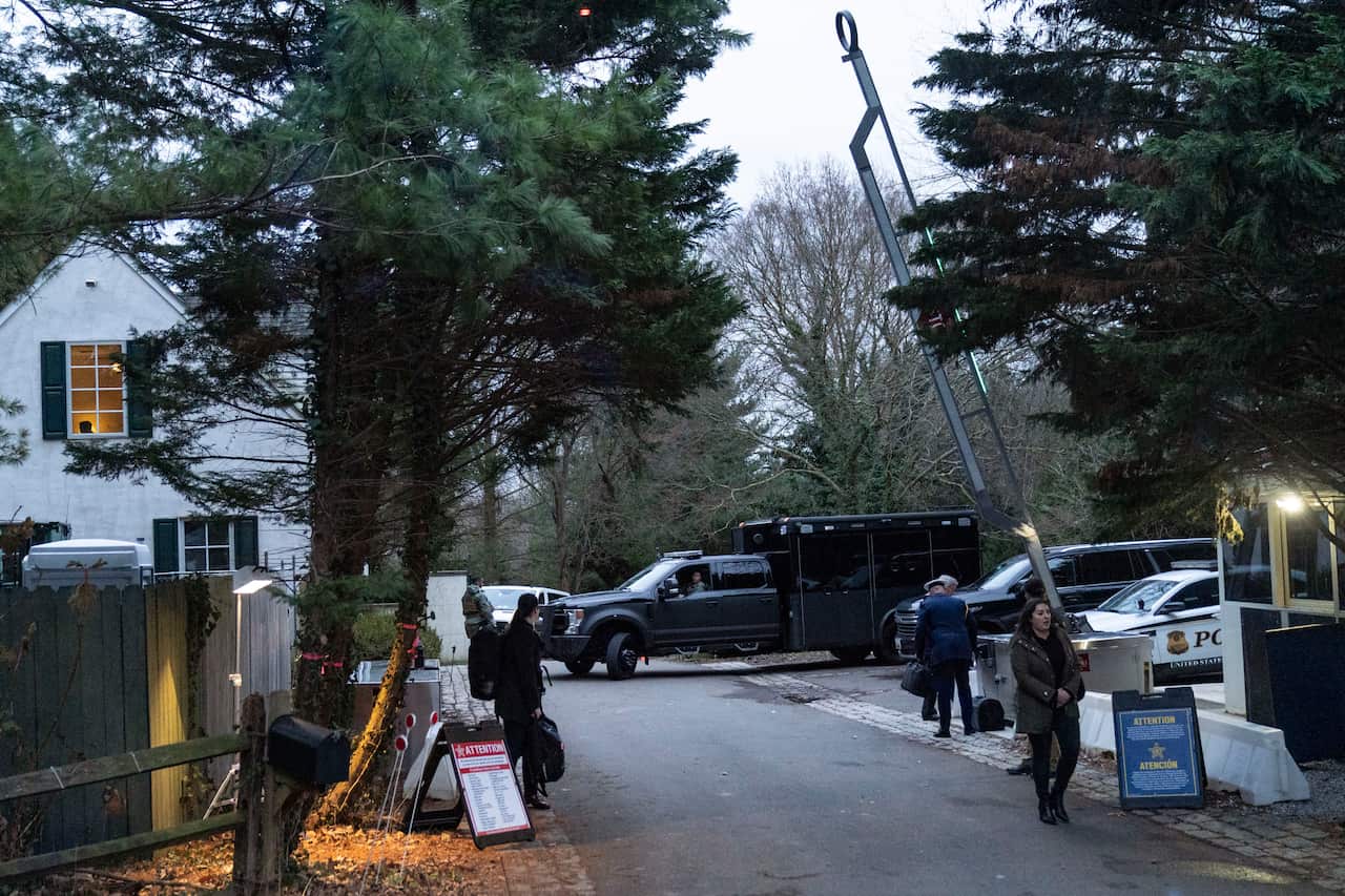 Vehicles parked outside a home.