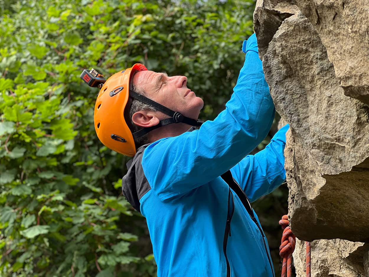 A man rock climbing in nature.jpg