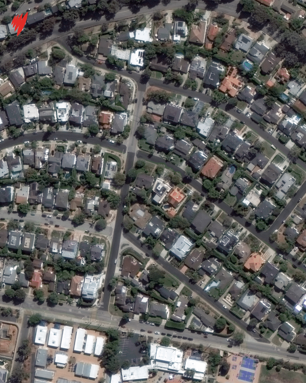 Satellite imagery showing homes before and after a devastating fire. 