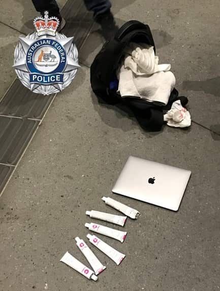 Investigators seized six tubes of professional hair dye wrapped inside a towel.