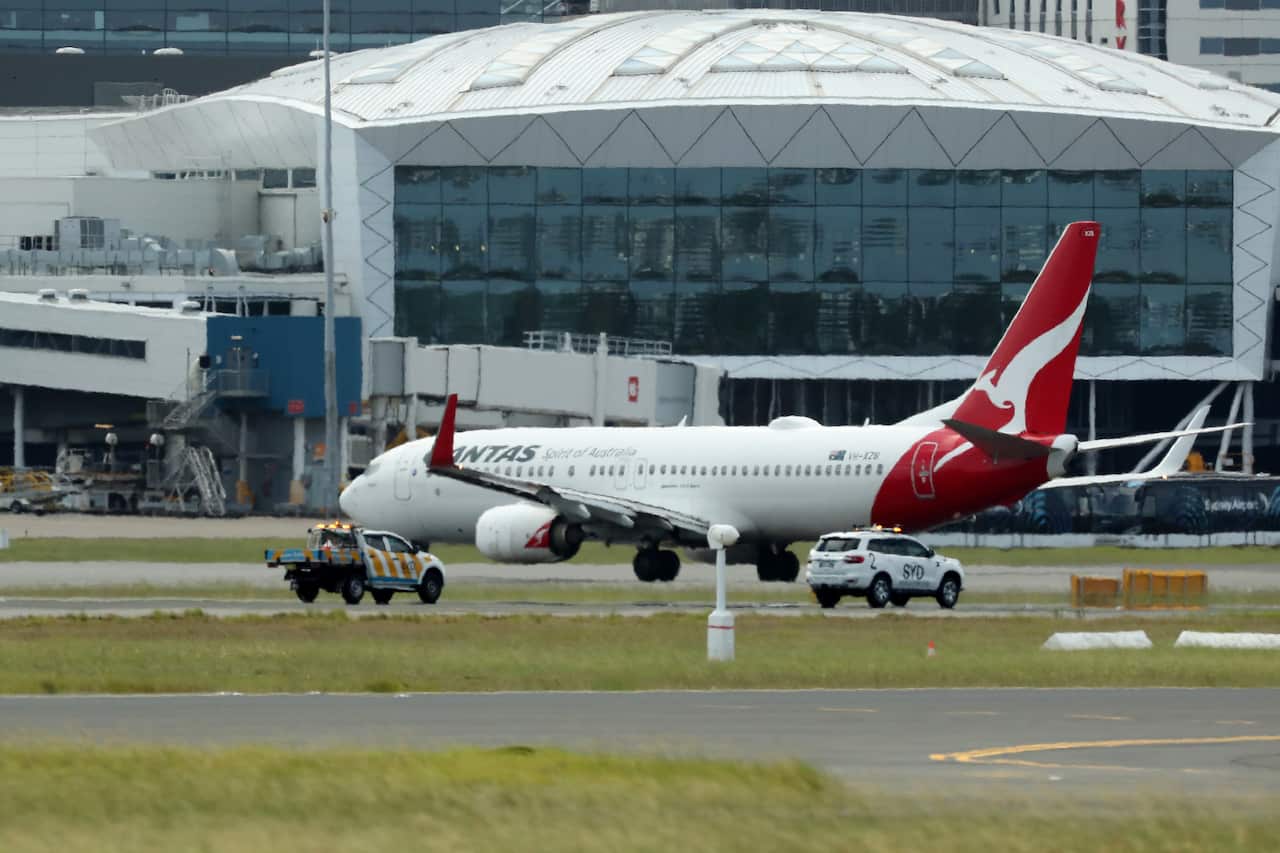 A Qantas plane on the tarmac.