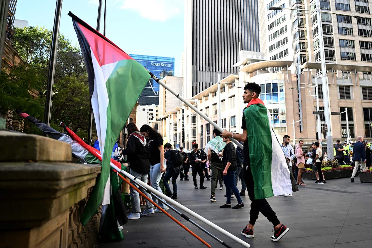 A flag is seen at a community vigil.