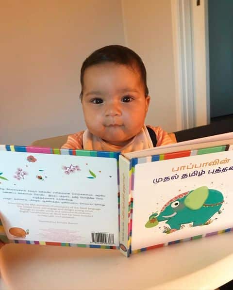 Meenakshi, reading her first Tamil book