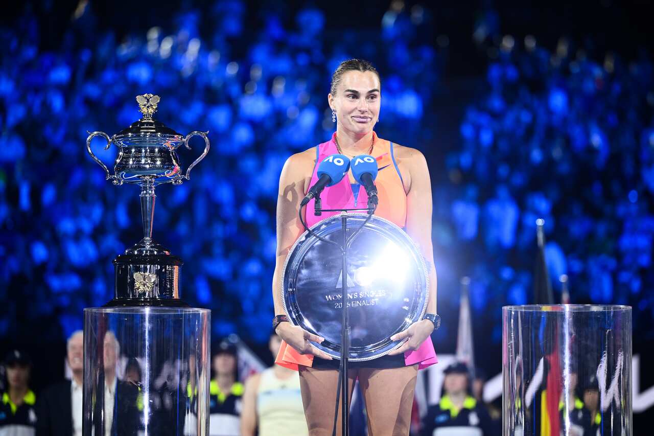 Woman standing with a silver plate.