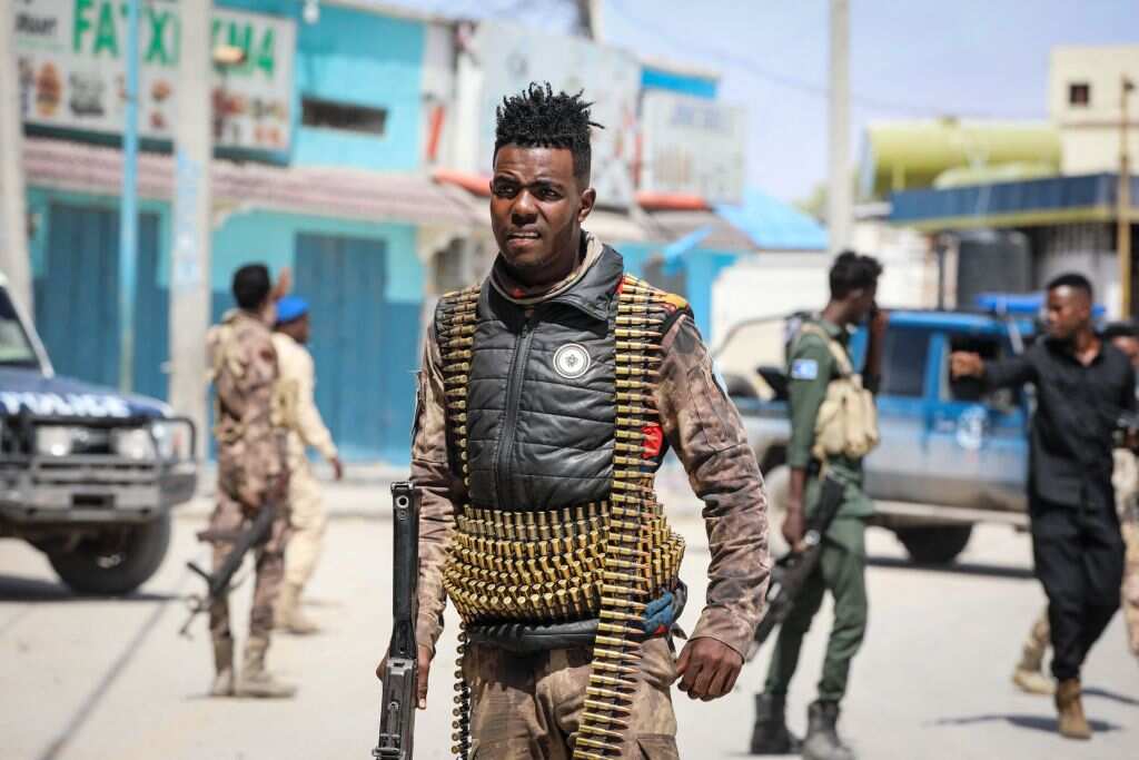Security officers patrol near the destroyed Hayat Hotel after a deadly 30-hour siege by Al-Shabaab jihadists in Mogadishu.